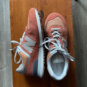 Orange and tan colorblock New Balance 574 sneakers